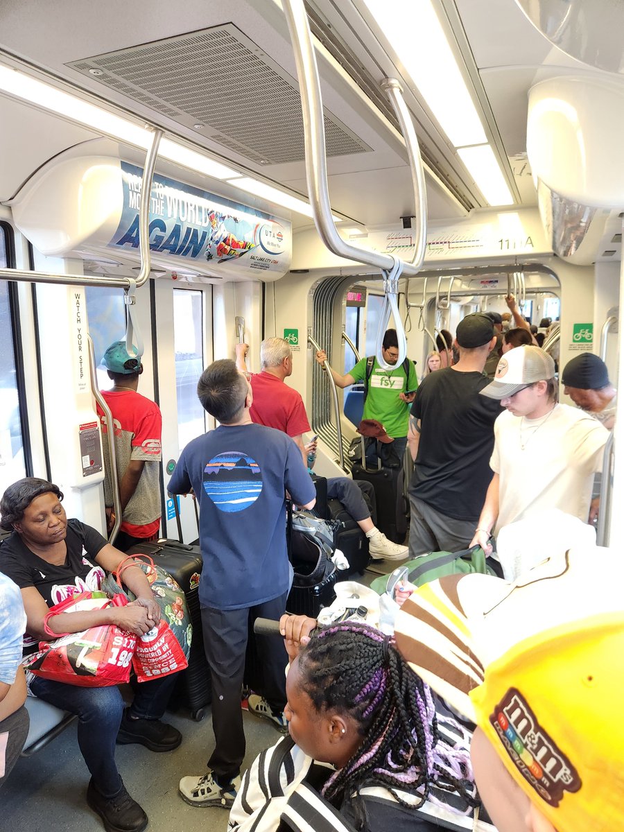 cabotnelson's tweet photo. Absolutely nuts for @RideUTA to only operate one car for the Green Line right now. Packed along with two dogs and two bikes. https://t.co/MZps1fsmF2