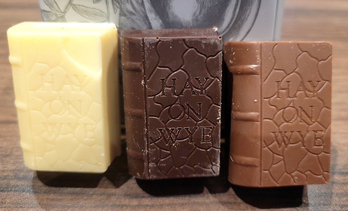 About to tuck into my amazing birthdays chocs from <a href="/BreconChocolate/">BreconChocolates</a> - the first photo is chocolate bookends and the second chocolate books ❤️ #booktwitter
