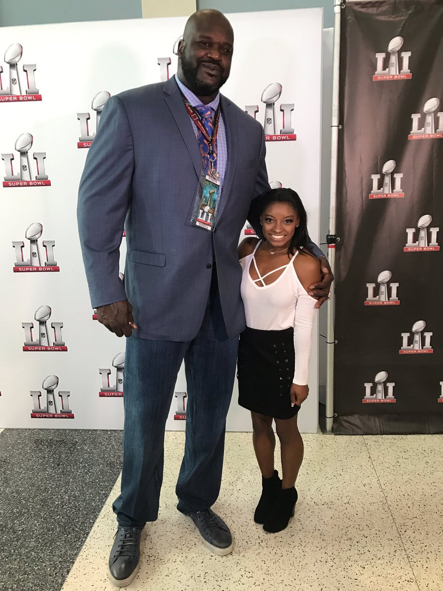 This photo looks fake but it’s not. Shaq is 7’1” and Simone Biles is 4’8”

During her routine, the top of Biles’ head got as high as 12 ft above the floor. This means she can jump over Shaq