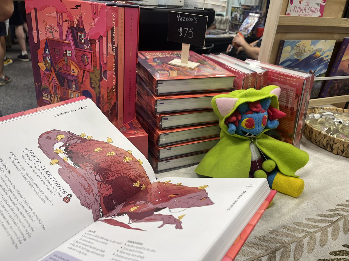 30 yazeba hardcovers at booth 2855 as of this picture. 25 as of me having a sec to post it. come quick :)