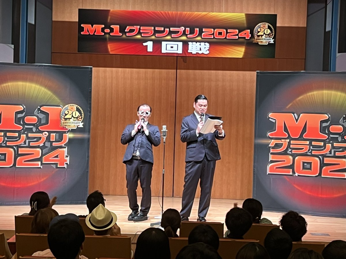 M1GRANDPRIX's tweet photo. M-1グランプリ、開演しました！
本日の1回戦のMCは「ななまがり」、
162組が出場予定です。
約7時間半の熱い戦いにご期待ください！！
審査結果の発表は、公式インスタグラムでライブ配信いたします！ https://t.co/JGVYJmDVSl