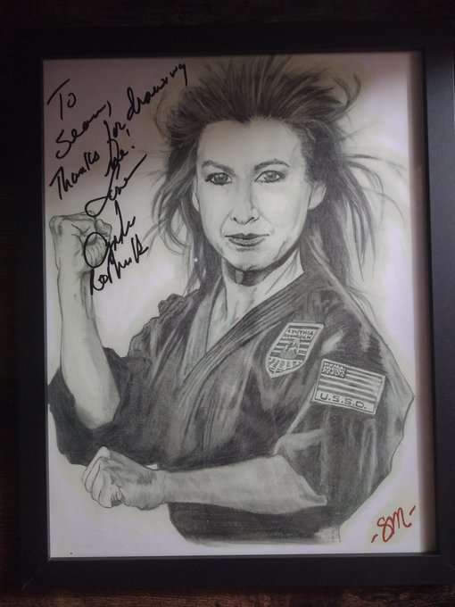 I had a photo print made of my drawing of Cynthia Rothrock. I asked her to sign it today and I framed