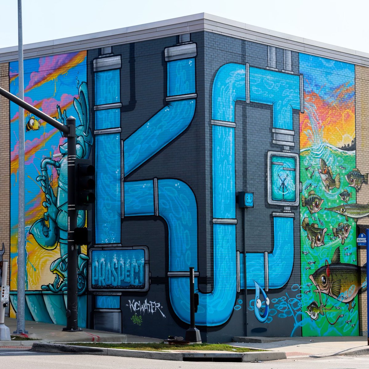 BrianDavidPlatt's tweet photo. Check out this new mural by @scribeswalk on our water services building at 18th and Prospect.  What do you think? https://t.co/M8b4XtB4Mp
