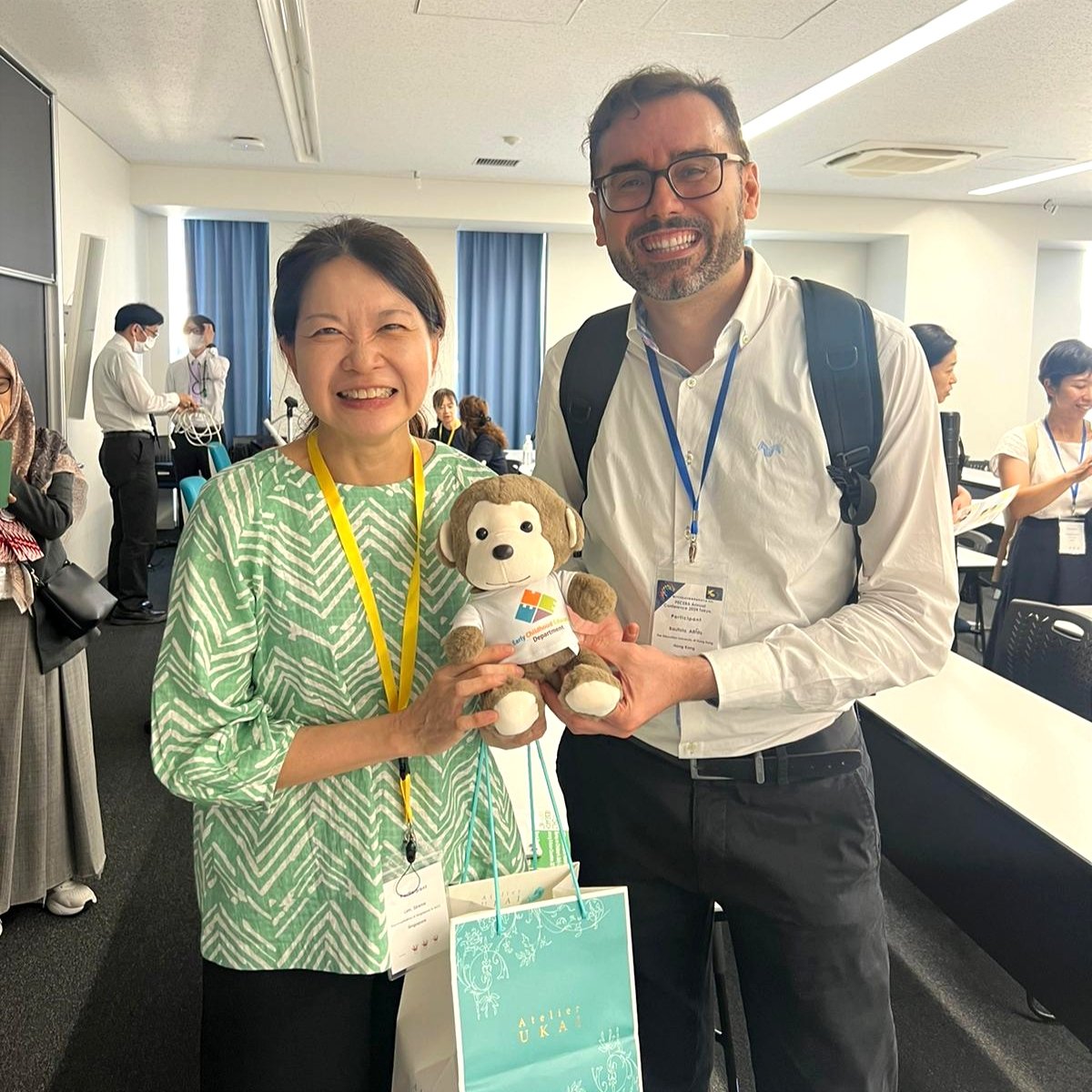 ECE_EdUHK's tweet photo. 🇸🇬🐒 Guess where Edu is heading next? Dr Alfredo Bautista (@Dr_A_Bautista) presents Edu, the ECE Monkey, to Dr Sirene Lim from the Singapore University of Social Sciences (@suss_sg), who was a speaker for Symposium 2 at #pecera2024 in Tokyo, Japan! 🇯🇵 #EduMonkey #ECE #EdUHK https://t.co/LOE7jRE7bE
