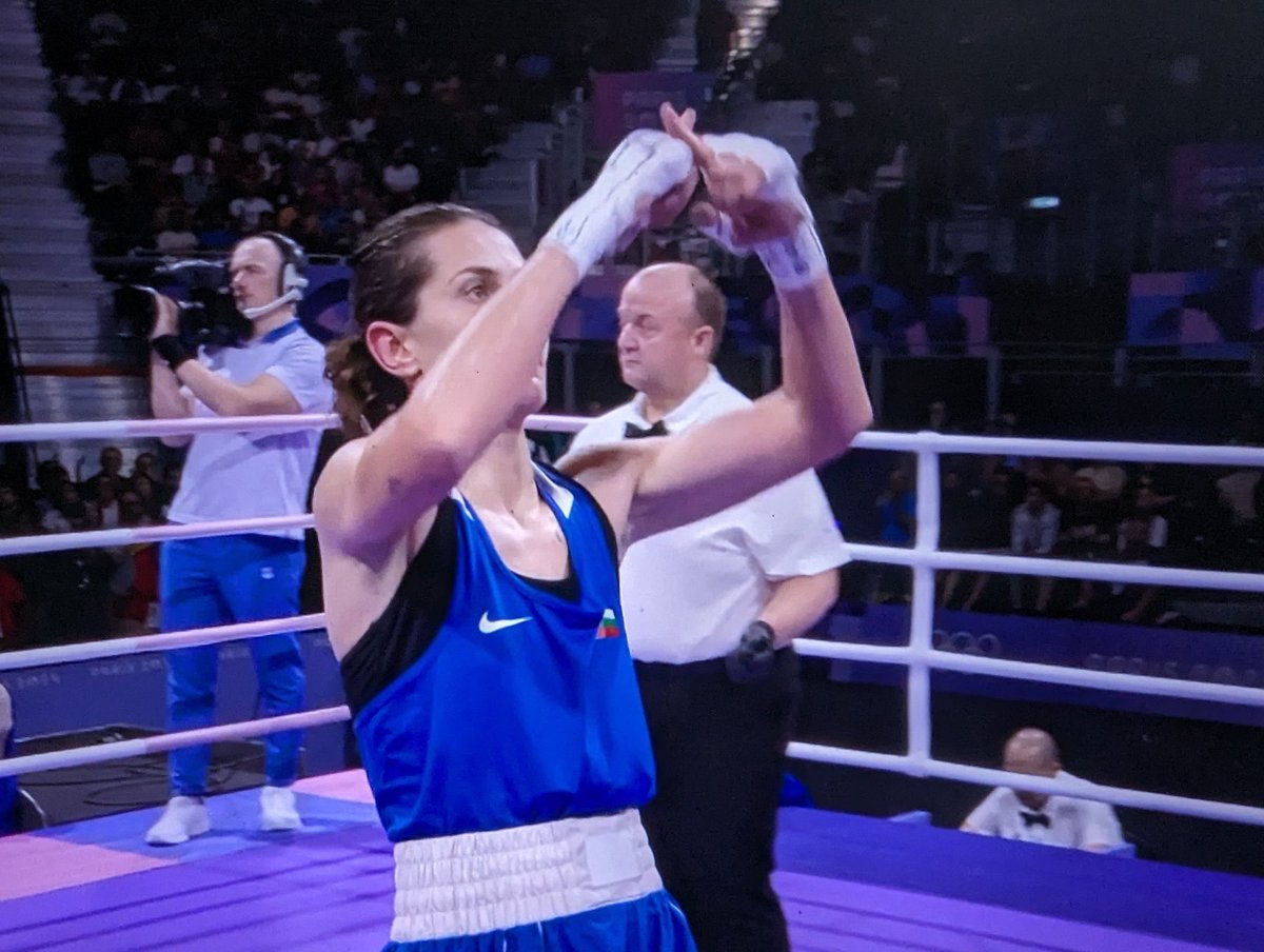 OliLondonTV's tweet photo. After beating beaten by a biological male boxer, Bulgarias Svetlana Staneva makes an ‘X’ hand gesture to send a clear message that she is a real woman. 

XX= Female Chromosomes. 

She made the gesture after refusing to shake hands with Lin Yu-Ting, who has male XY Chromosomes. https://t.co/eKmqOAns7R