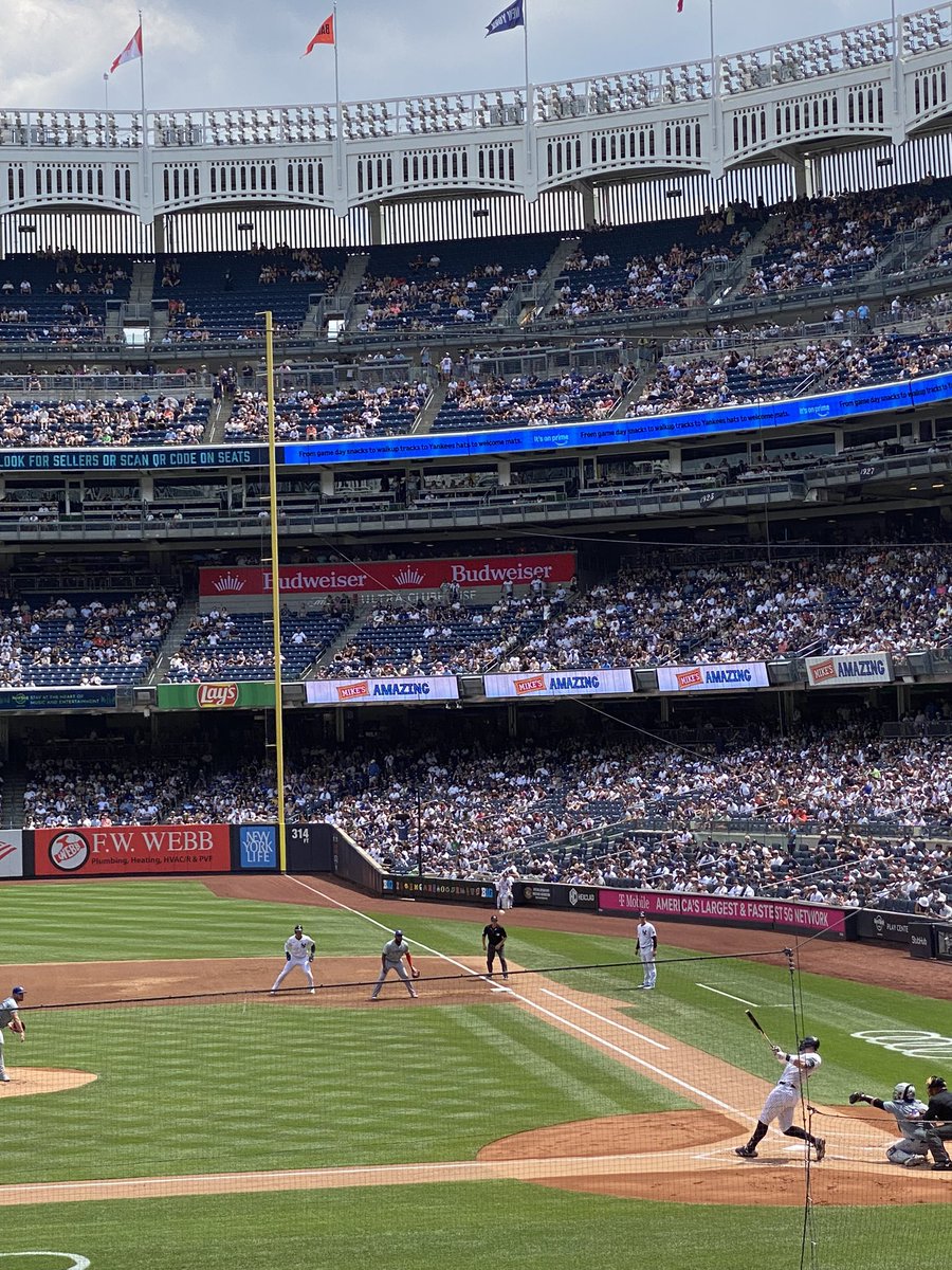 VXCarlo's tweet photo. @Yankees @STIHLUSA From my perspective…
If you zoom in, you can see the ball in flight  - 
“just above” what appears to be at the 1 o’clock position of the first base umpires head… 

It’s not of course “above his head” - but in the foreground.

Great day! https://t.co/FGflSU3U2x