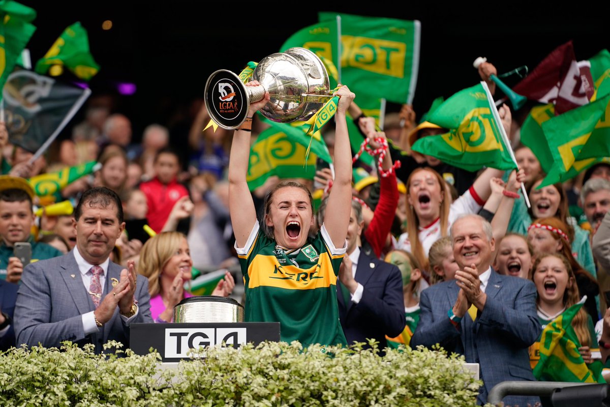 radiokerrysport's tweet photo. Niamh Carmody lifts the Brendan Martin Cup as Kerry are crowned All-Ireland Champions! https://t.co/jDTgiFuRjY
