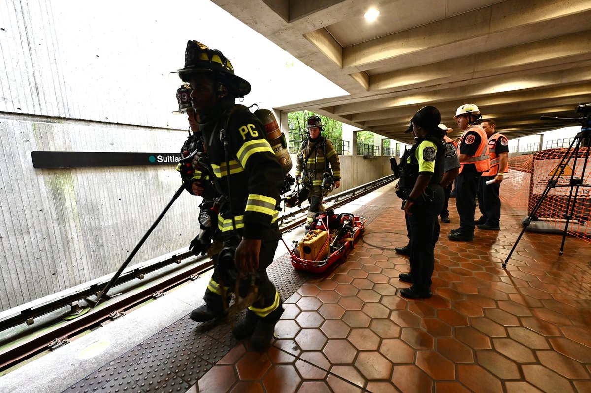 PGFDNews's tweet photo. This morning PGFD units drilled with @dcfireems &amp; @wmata personnel at the Suitland Station. The training scenario included a derailed train car, extricating a trapped passenger &amp; transporting several other injured passengers. #ServiceIsTheMission https://t.co/tAVLcoNqPa