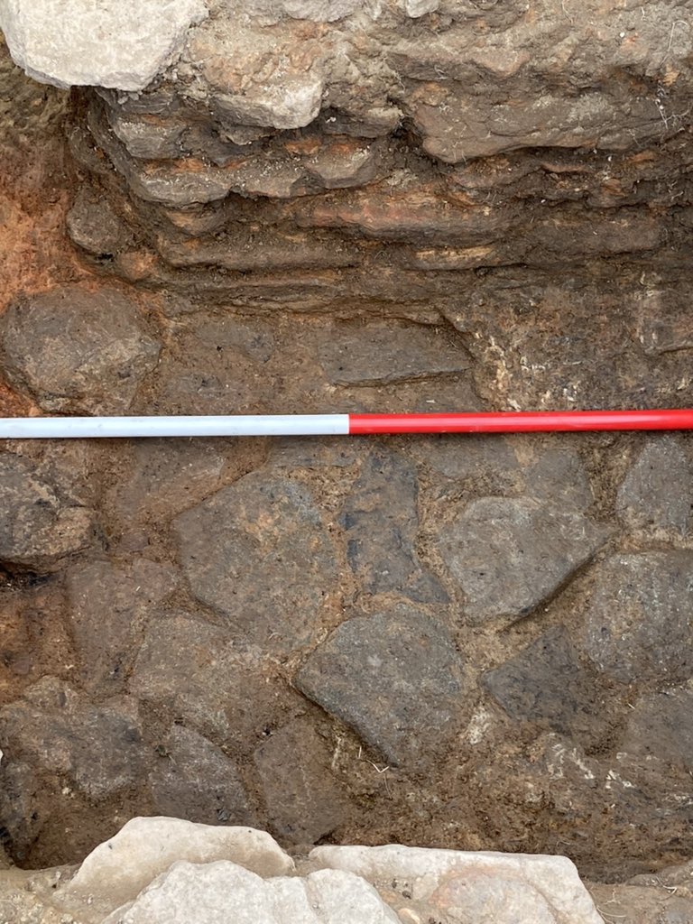 Well we’ve not yet found the back edge of our walled feature but the layer containing the charred wood peeled off  onto a nicely laid, cobbled floor. One theory is that we now have a grain drying kiln but watch this space! We return tomorrow #Castleshaw #Romans