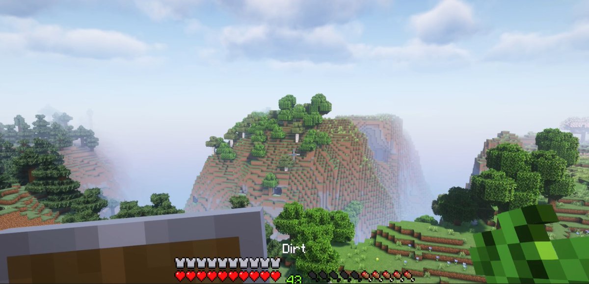 64bitRick's tweet image. Check out this view of a bloody magnificent mountain range with fog under the cloud lines in my survival world. I look forward to building something on top of that mountain in the middle! #Minecraft #shaders #Minecraftshaders #Gaming #64bitrick