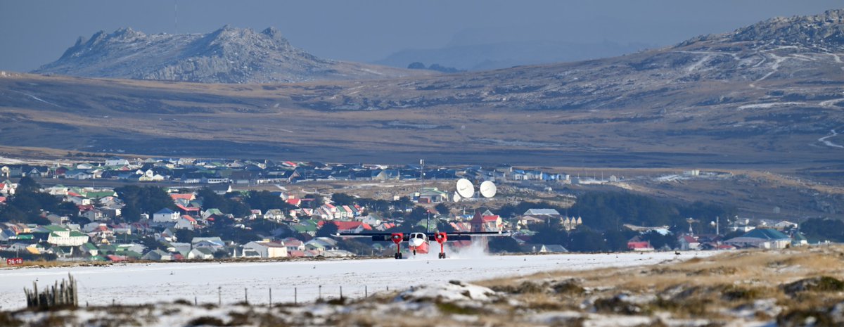 StephenLuxton's tweet photo. #FIGAS, the @FalklandsGov Air Service, operating their @BrittenNorman Islanders from a snowy (but unusually calm) Stanley airport today. #Weather doesn't stop things in the #FalklandIslands 🙂🇫🇰🇬🇧 https://t.co/0PaDUNzuyp