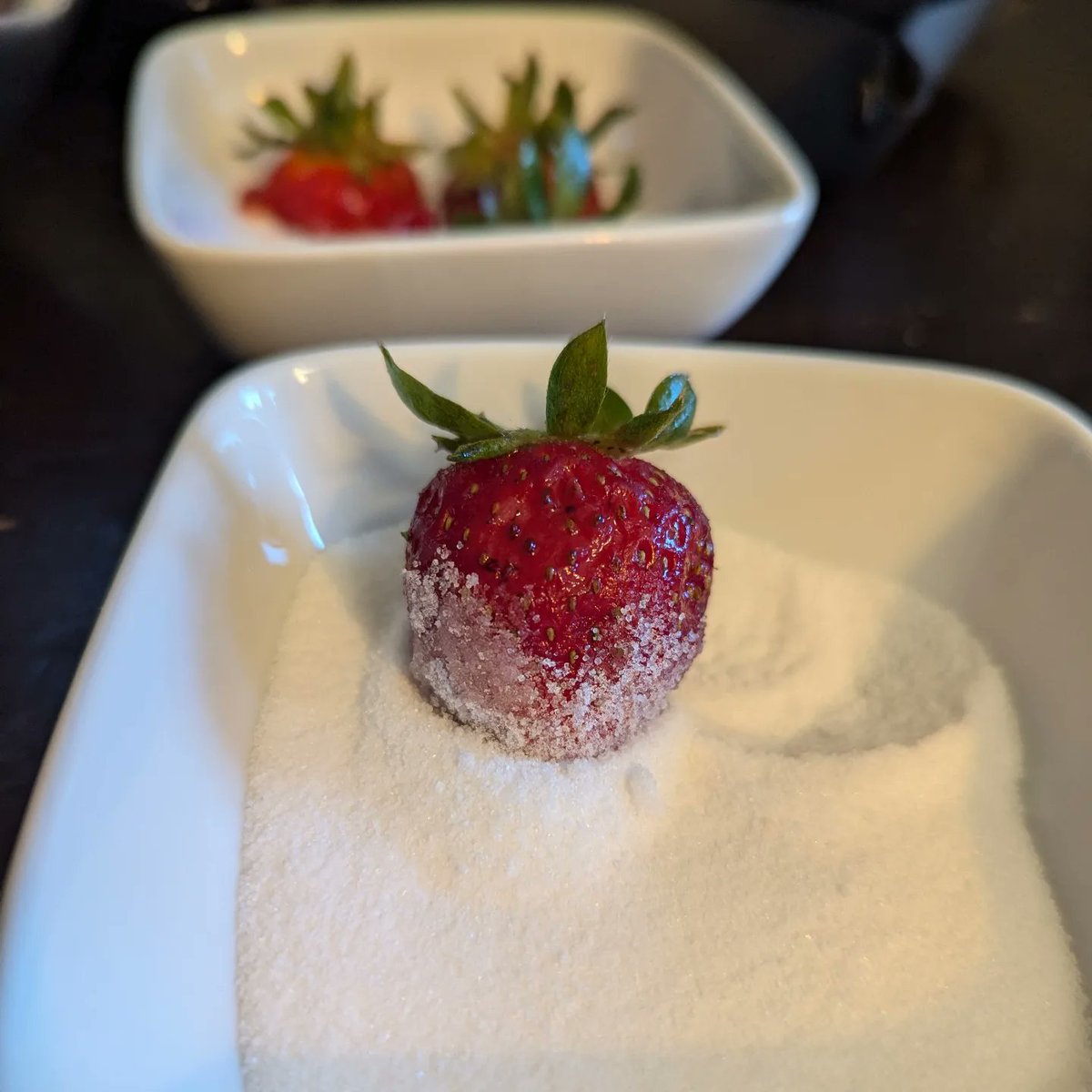Level up your strawberry game, mix a bit of salt with some sugar. 

You're welcome