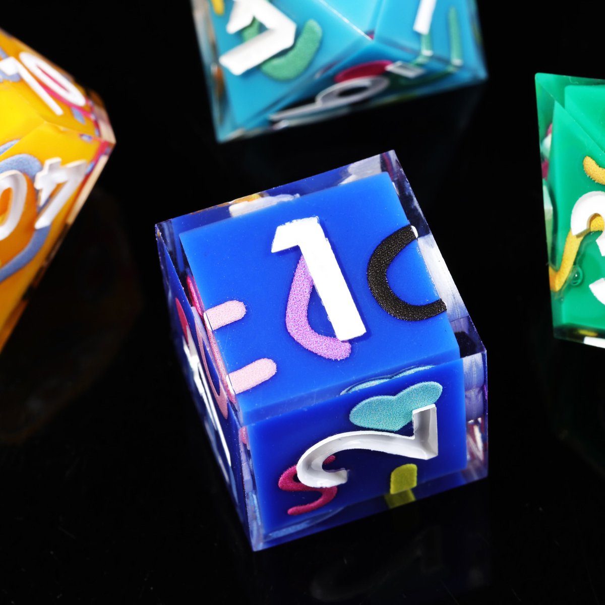 MiniPlanetDice's tweet photo. This is a multi-color sticker. Hope you like it #dice #dnddice #resindice #handmadedice #ttrpg #sharpedgedice #polyhedraldic https://t.co/XGYZo0dNiv