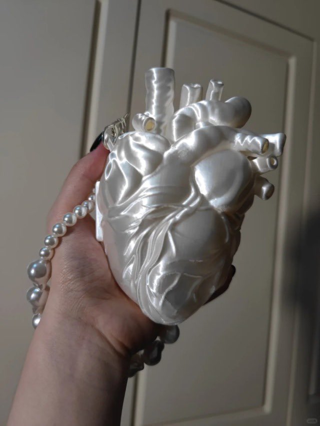 MOZZAFIATO ‘Silk Core Clutch’ by Evangeline Vangeance, 2023.