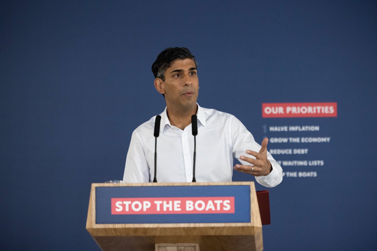 Here’s you standing in front of a lectern with the words that are now a fascist slogan…spare me your shock.