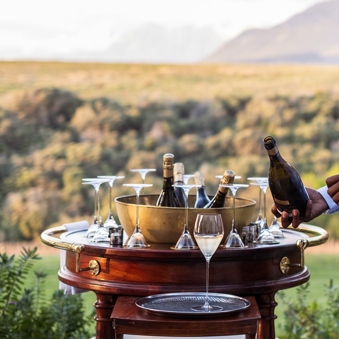 Champagne on the terrace at Rust en Vrede Restaurant. Pre-dinner drink with a view! Join us for our winter special during August. R790 for a 6-course menu. Reservations are essential. Book online or call 021 881 3757.