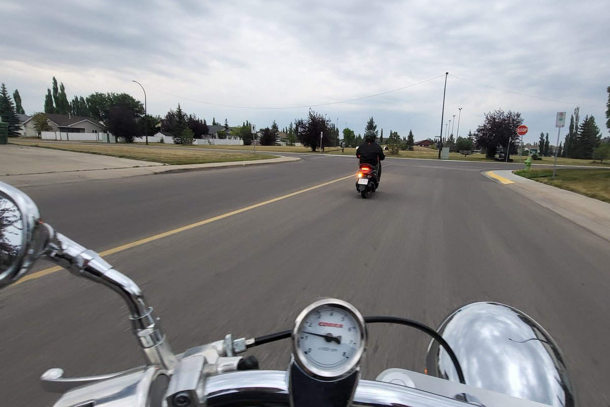 firewallalberta's tweet photo. Out for a ride with my son. First time riding together. Nice to be able to share something with him that's so fun. #motorbike #scooter #FatherSon #OutForARip https://t.co/AapeUOrU9A