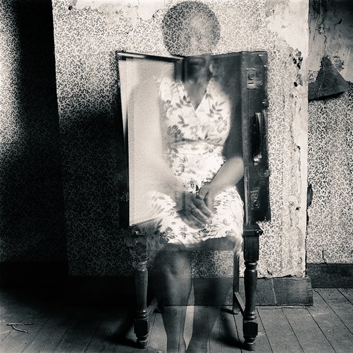 Togo born artist Hélène Amouzou, 'Between the Wallpaper and the Wall' Belgium/Togo (2004-2011), photographic portrait series on seeking asylum #WomensArt