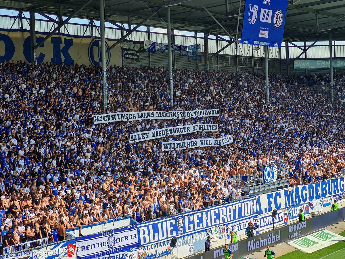 fussballmafiade's tweet photo. Der Block U hat einen Olympiasieger in seinen Reihen! 🥇
Beim Heimspiel gegen Elversberg grüßten die FCM-Fans Lukas Märtens, der bekennender Magdeburg Fan ist und bereits seit seiner Kindheit in der Fankurve steht. 👏
#FCMSVE #EinmalImmer https://t.co/EFqsIDcm3P