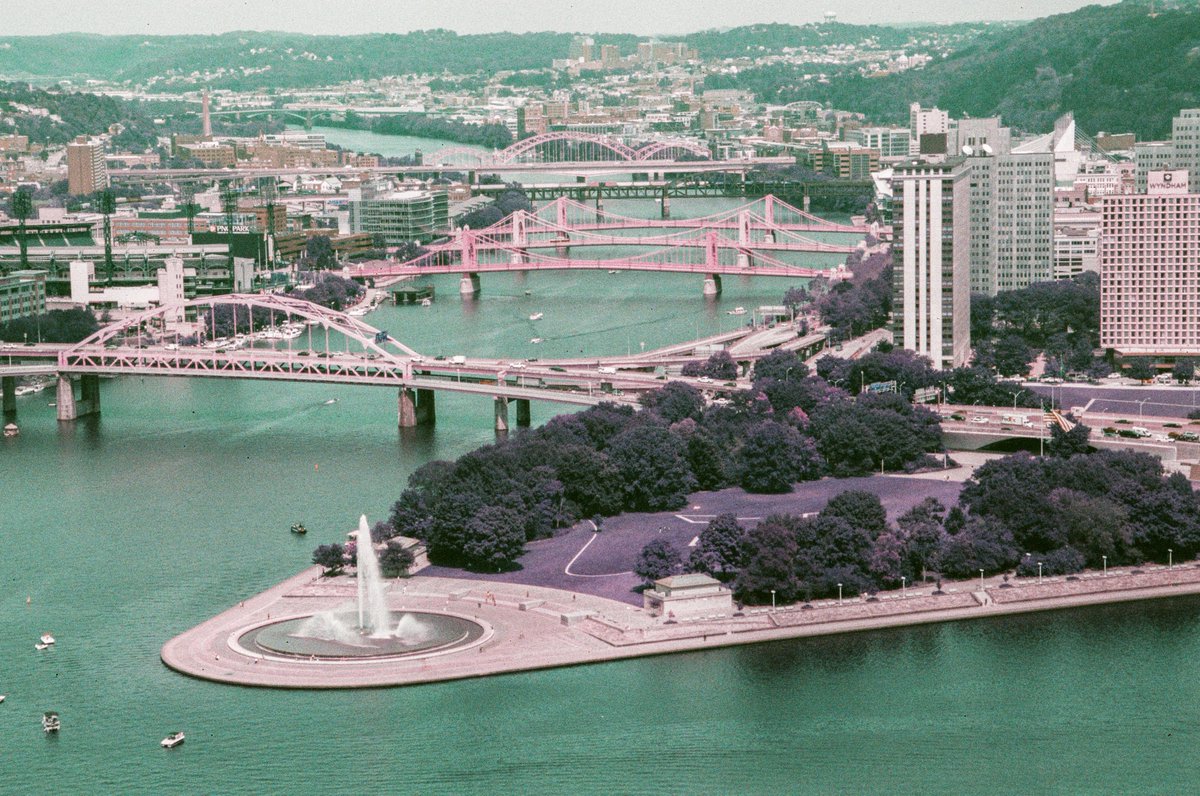 DaveDiCello's tweet photo. I've been waiting to see how these scans turned out, and I gotta say, I'm really happy with them. No editing on these: they were shot with Lomography's LomoChrome Purple Pétillant 35mm film, which turns greens to purple and yellows to a kinda orange. Made #Pittsburgh look surreal https://t.co/zpzey0EE5V