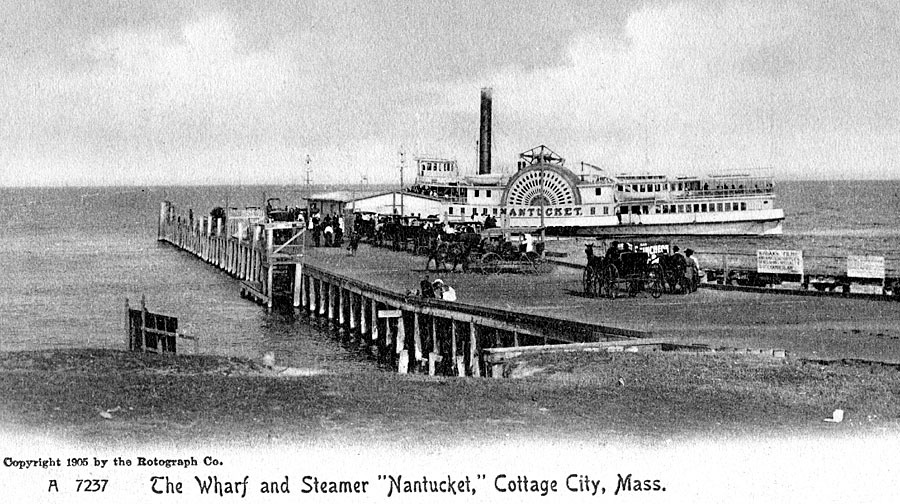 Sidewheeler ferry Nantucket at the wharf in Oak Bluffs, Massachusetts in a 1905 postcard image.