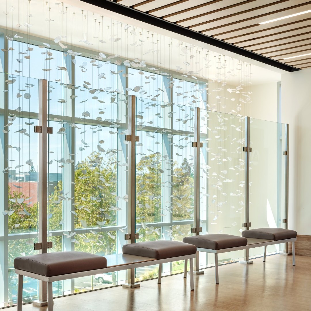 The subtle, textural fluttering of LightArt's mobile petals utilize the rich natural light brought in by the expansive windows and neutral tones of the El Camino Women's Hospital in Mountain View, CA.

#sculptural #interiordesign #healthcaredesign