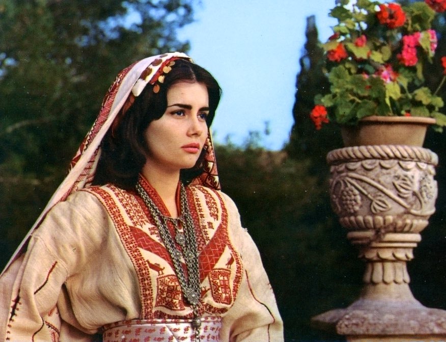 A Lebanese beauty wearing a traditional Ramallah style Thobe, 1960s.