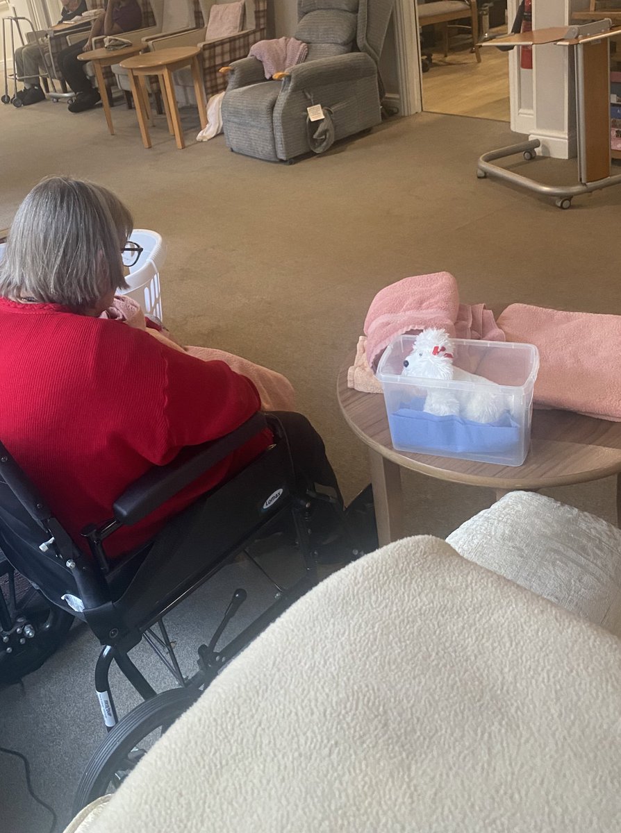 Helping to fold laundry today to keep her hands moving!