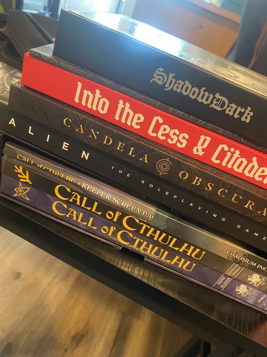 PookieRex's tweet image. Gencon TTRPG haul!