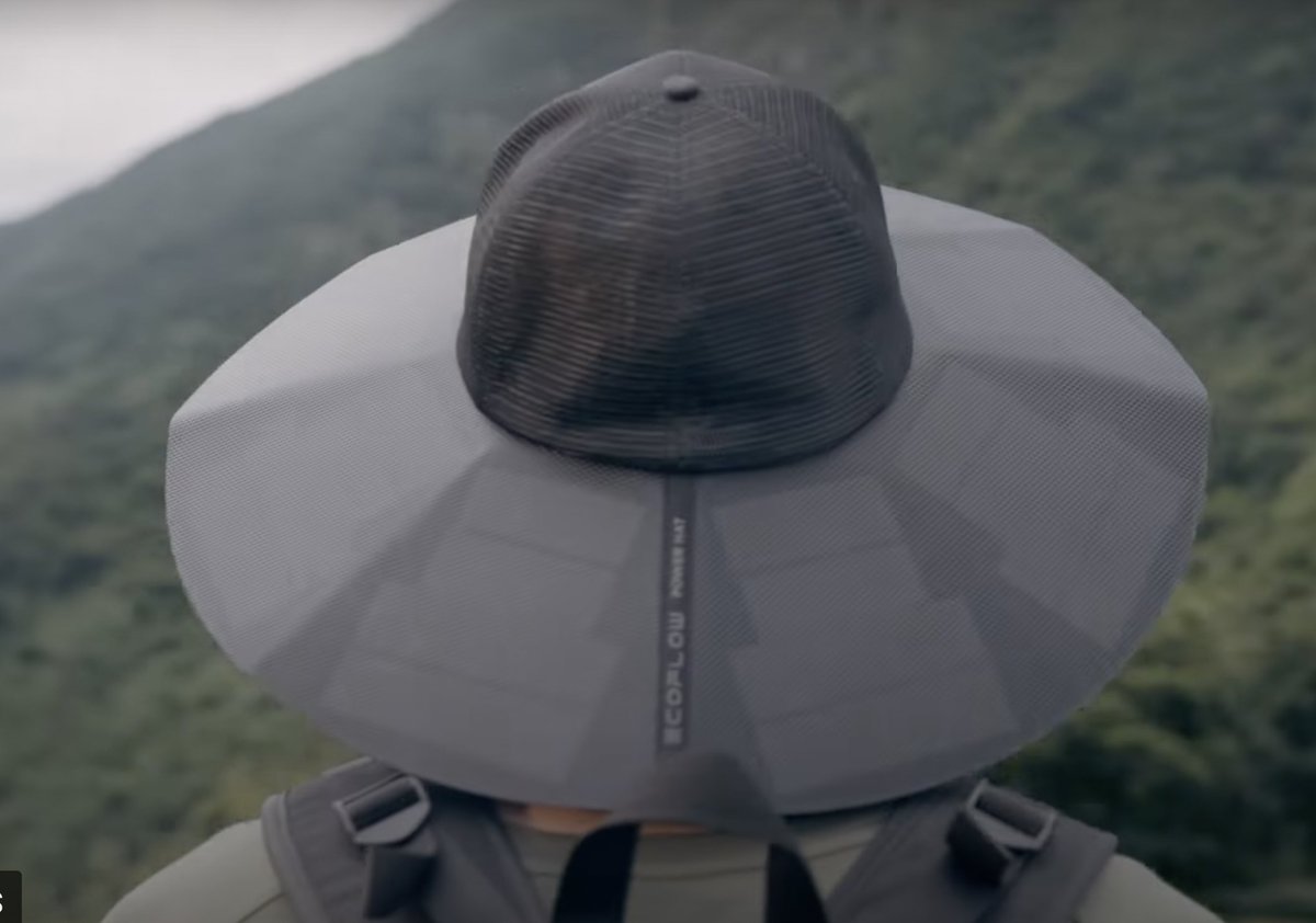 Dexerto's tweet image. There are now solar hats you can use to charge your phone outdoors