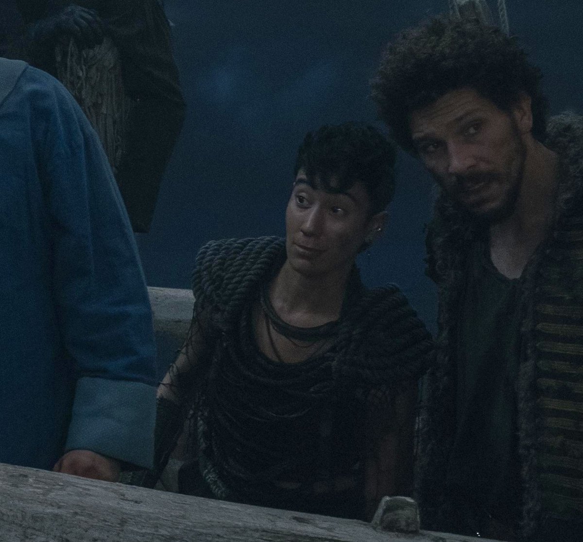 everyone else is looking at the target and jim will NOT take their eyes off archie handling a weapon