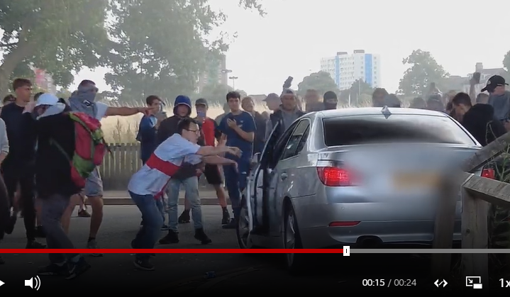 This little scrote in the England shirt, is the same scrote that was imaged looting shops, right? 
Anyone involved in this thuggery is nothing more than mindless racists and they have no place in a civilised society. Disgusting and shameful behaviour