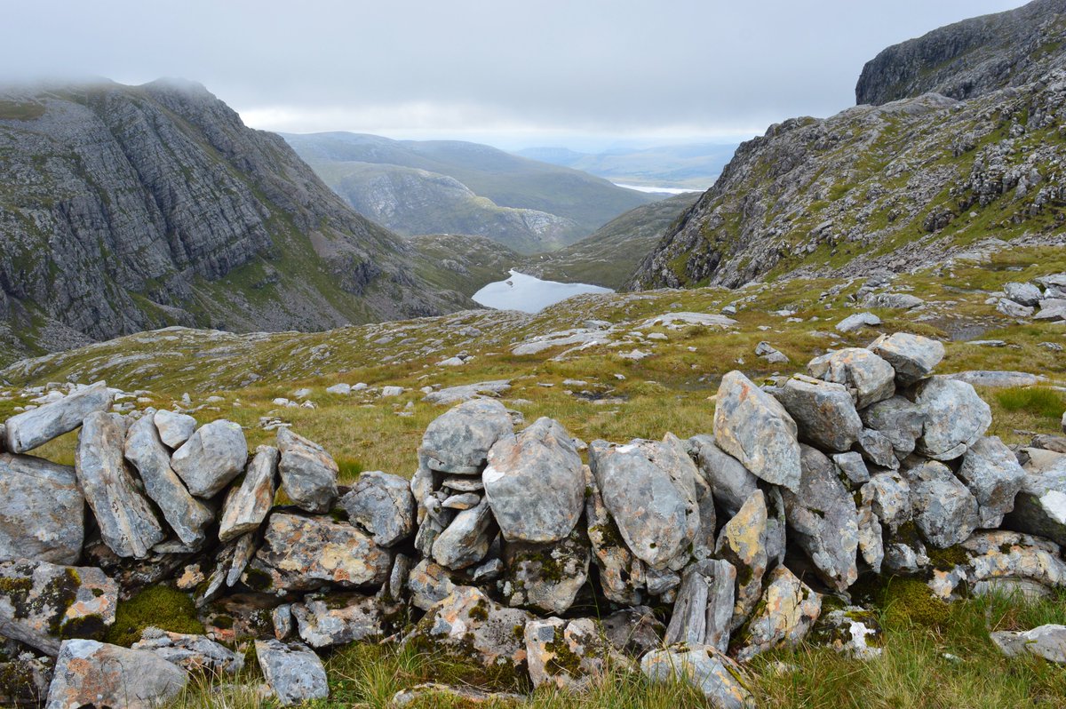 UlaKempinska's tweet photo. A long summer day on the Beinn Dearg (Ullapool) Munros ⛰️ 230-233. The huge wall that runs up Beinn Dearg from the bealach is like a massive mountain spine! The path to the summit follows a section of the wall #walkingscotland #munros #hillwalkingscotland #outandaboutscotland https://t.co/ytG7cupX3I