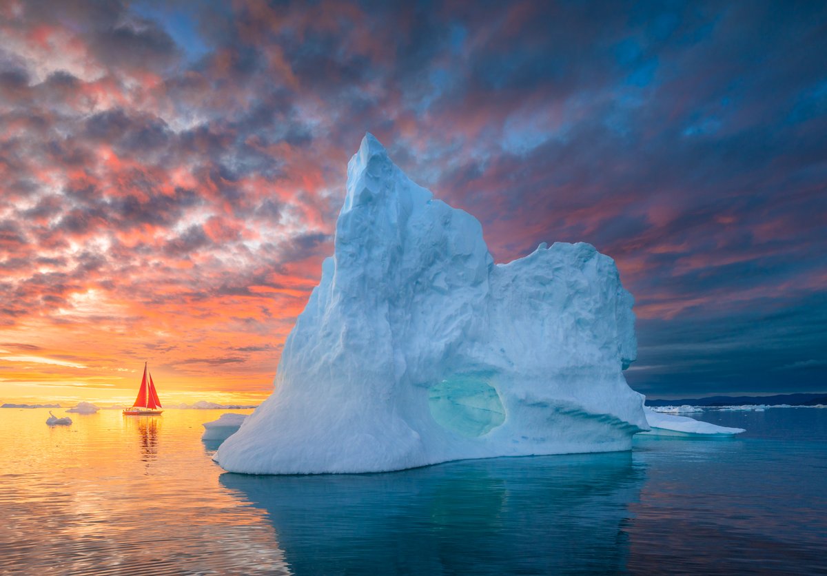 albertdrosphoto's tweet image. Moments with our red sail boats in Greenland from this year.