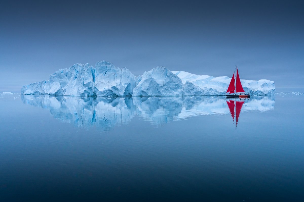 albertdrosphoto's tweet image. Moments with our red sail boats in Greenland from this year.