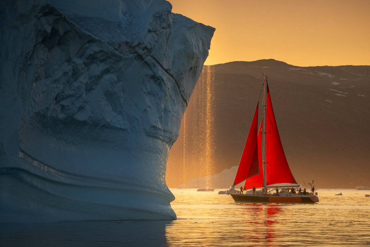 albertdrosphoto's tweet image. Moments with our red sail boats in Greenland from this year.