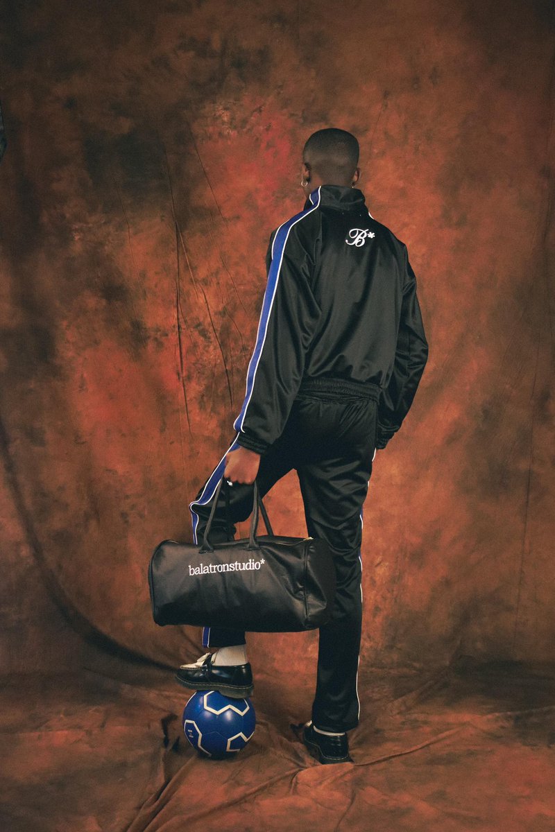 Balatron sport tracksuit. Suit up in style for athletic days💙