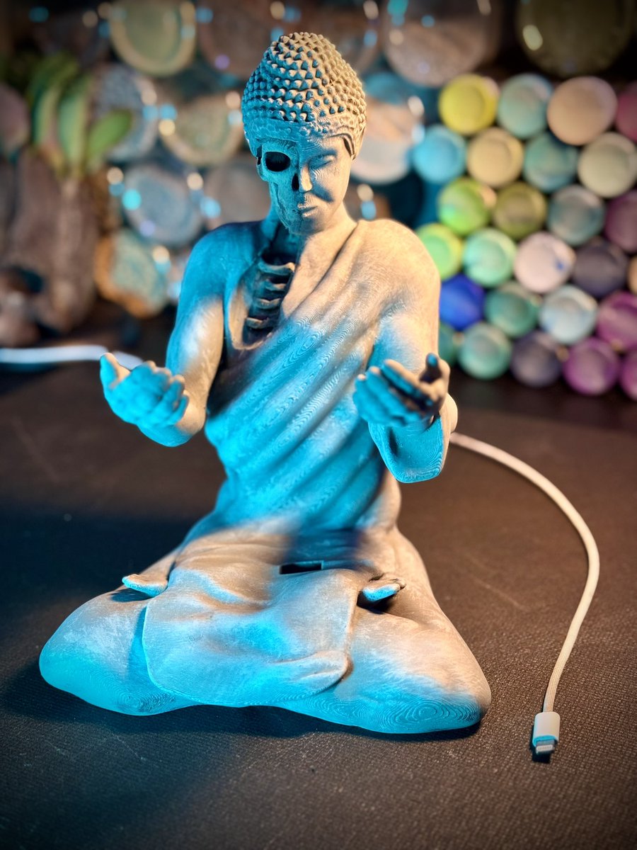 thebillyhooper's tweet photo. “The sacrifice” 3D printable phone charging station. the STL is free if you want to print it. #3dprinting #sculpture #Halloween #skeleton #Siddhartha https://t.co/NGgnJmMV6J