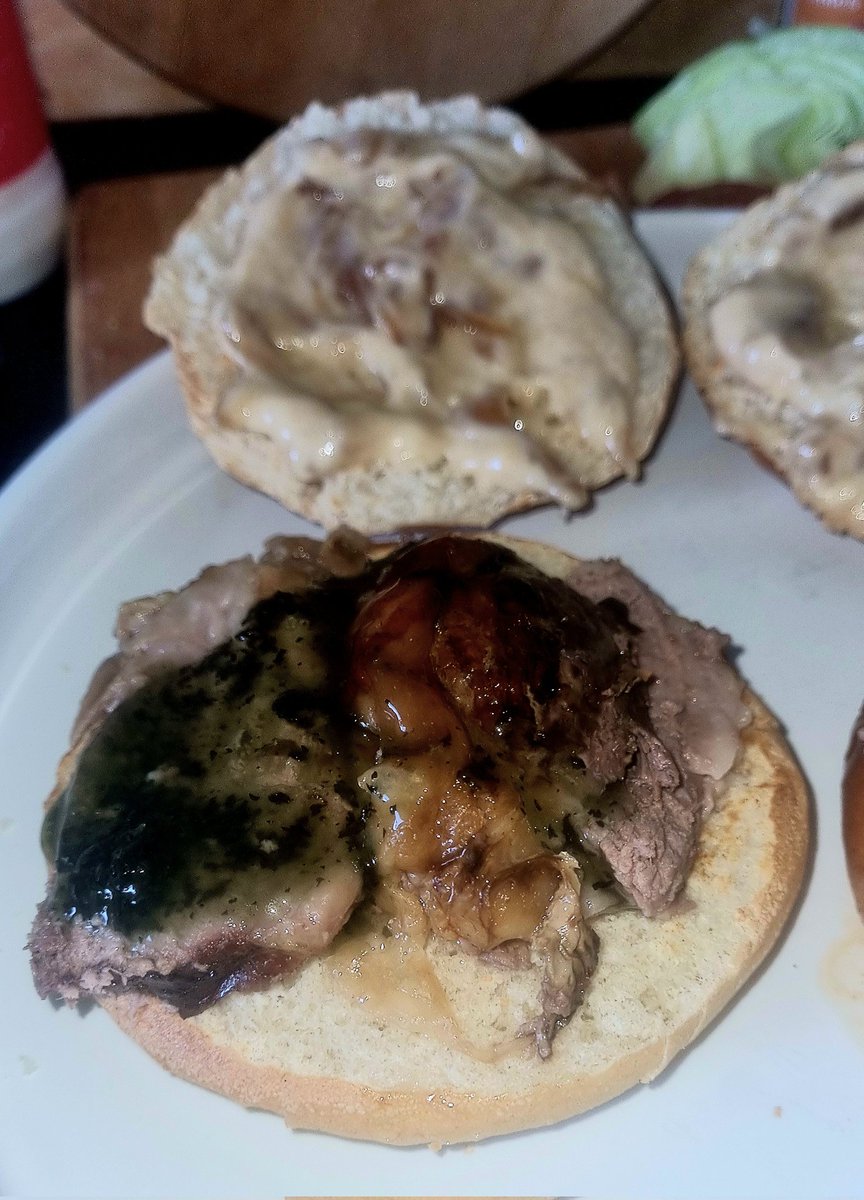 AwTroon's tweet photo. Warm toasted brioche rolls with warm roast lamb and mint sauce. A caramelised onion mayo and salad.
Some juices from the lamb roast to dip into. That's me fed for a day. One spare for supper #Foodie #ScottishKitchen https://t.co/cgttT17kXp