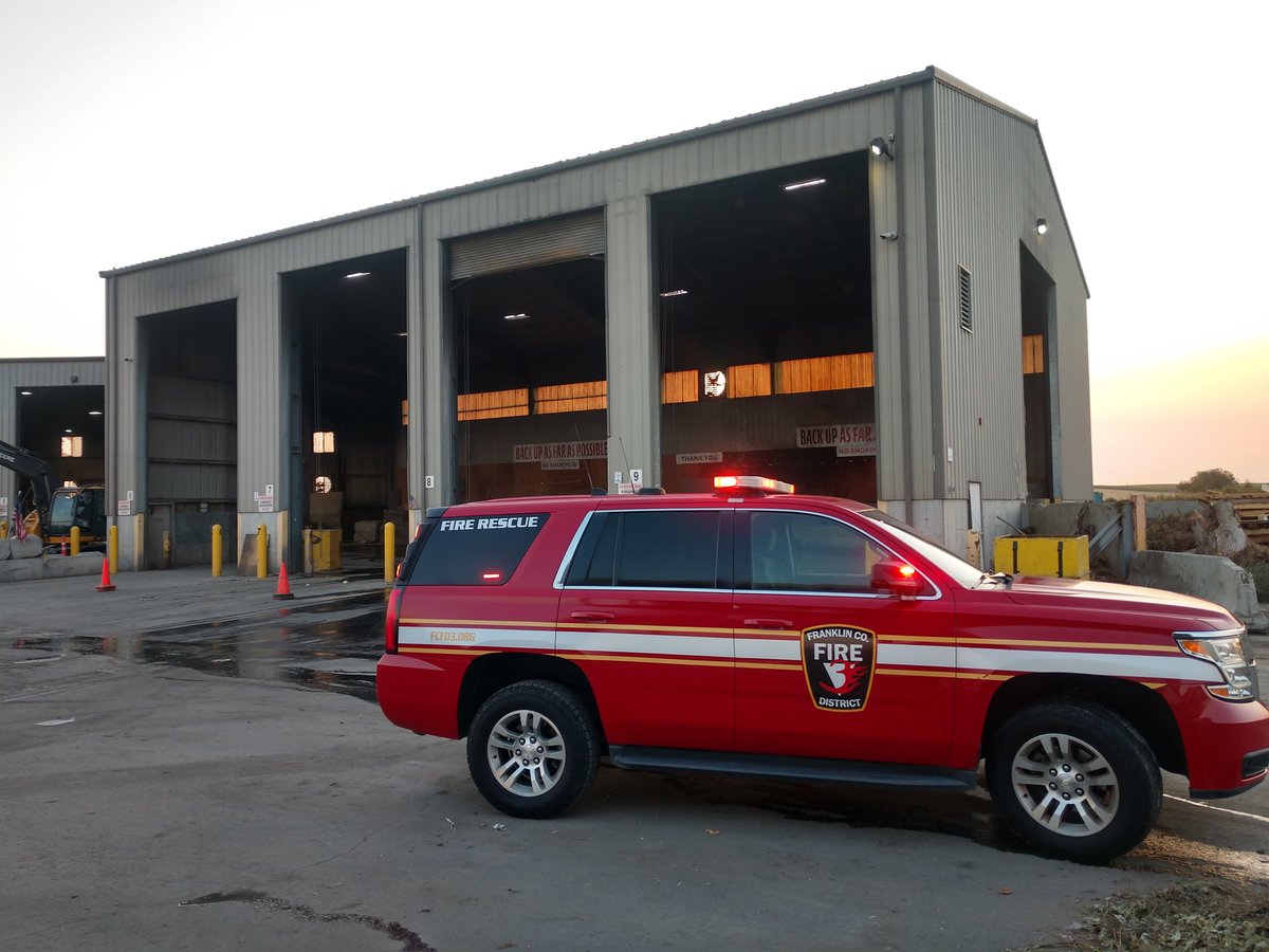 FranklinFire3's tweet photo. On scene of a garbage fire inside a building at Dietrich Disposal, 1721 Dietrich Road.  Fire is out and fire crews are waiting for employees to remove the garbage.  No injuries.  @PascoWAFire assisted. https://t.co/MHIAeKdUab