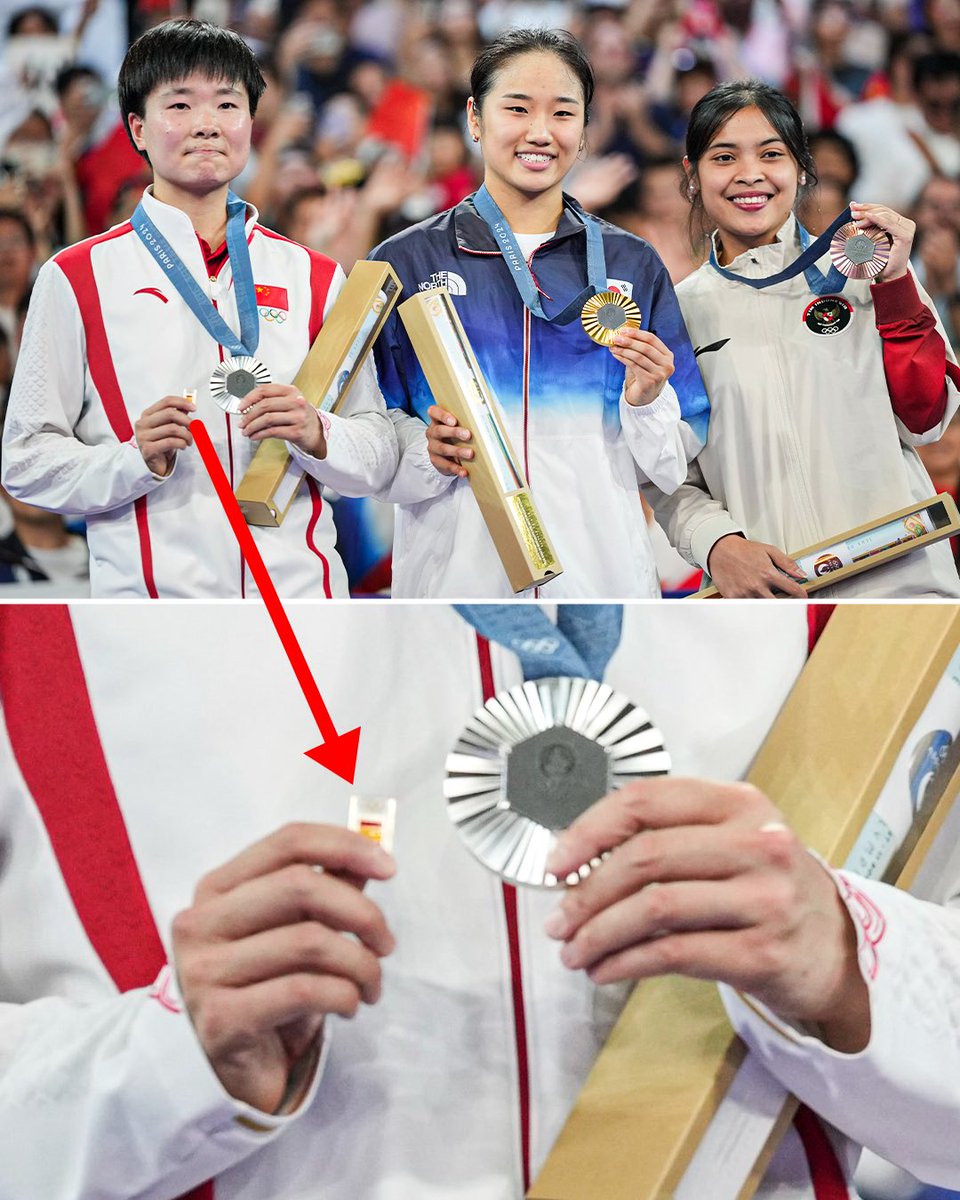 TheFinal__'s tweet photo. Chinese shuttler He Bingjiao carried a Spanish pin on the podium to pay tribute to fellow badminton player Carolina Marin, who had to forfeit the semifinal match against Bingjiao due to injury 🙏👏 https://t.co/DNVYa0o6Zc