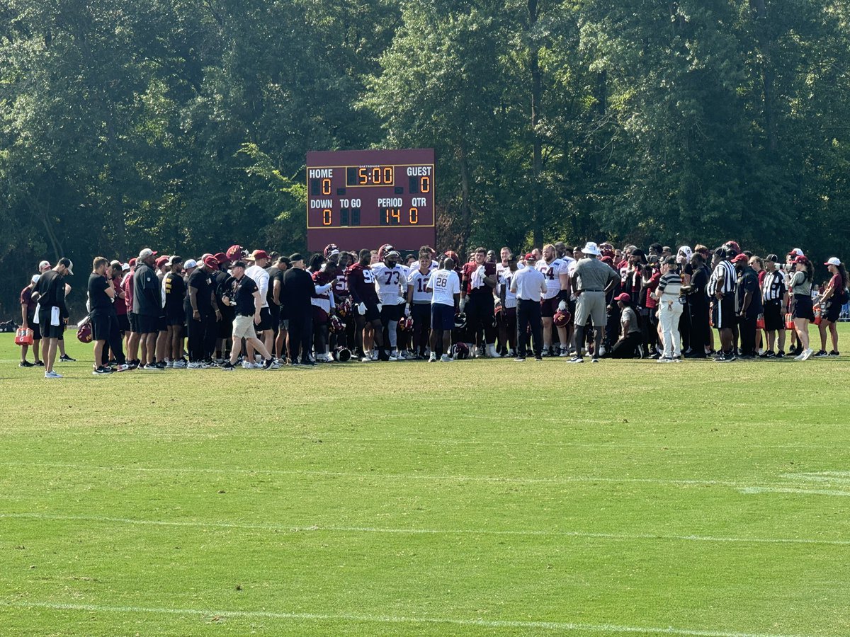 NickiJhabvala's tweet image. Darrell Green and Joe Gibbs talking to players after practice.