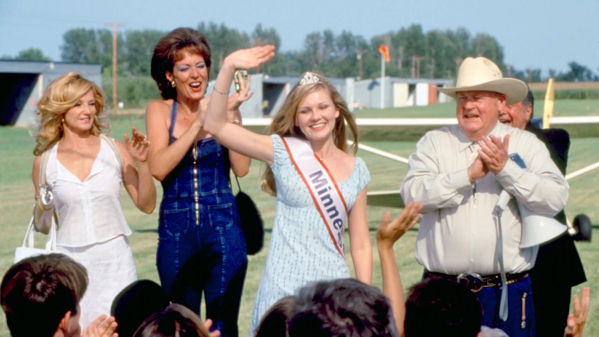 Tim Walz with Minnesota's American Teen Princess winner Amber Atkins, ready to canvas