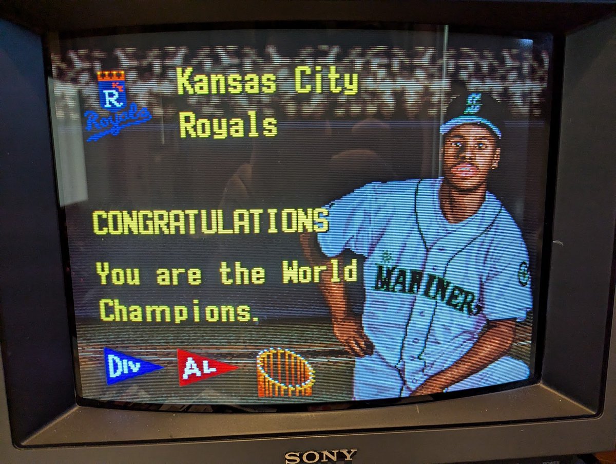 It took me a couple of months, but I finally completed a full season in Ken Griffey Jr. Baseball and won the World Series!

Yes, I'm an old man and took a photo of my TV.