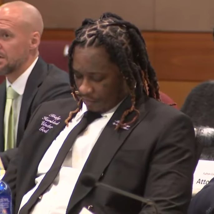 nfr_podcast's tweet photo. Young Thug wearing a custom 'Truly Humbled Under God' suit in court today 🔥

If you recall, last year his lawyer revealed that this was the meaning to his name "Young T.H.U.G." https://t.co/ARtvBxTLqy