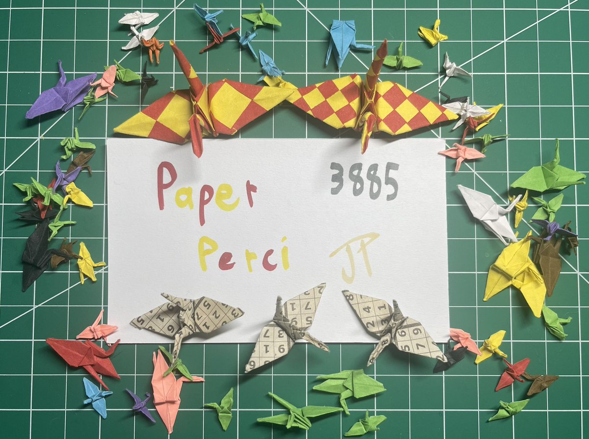 PaperPerci's tweet image. Cut some origami paper into strips. Weaved them into a sqaure. Then made the cranes. The 3 number ones were made from the solutions to sudoku puzzles. #origami #crane #sudoku