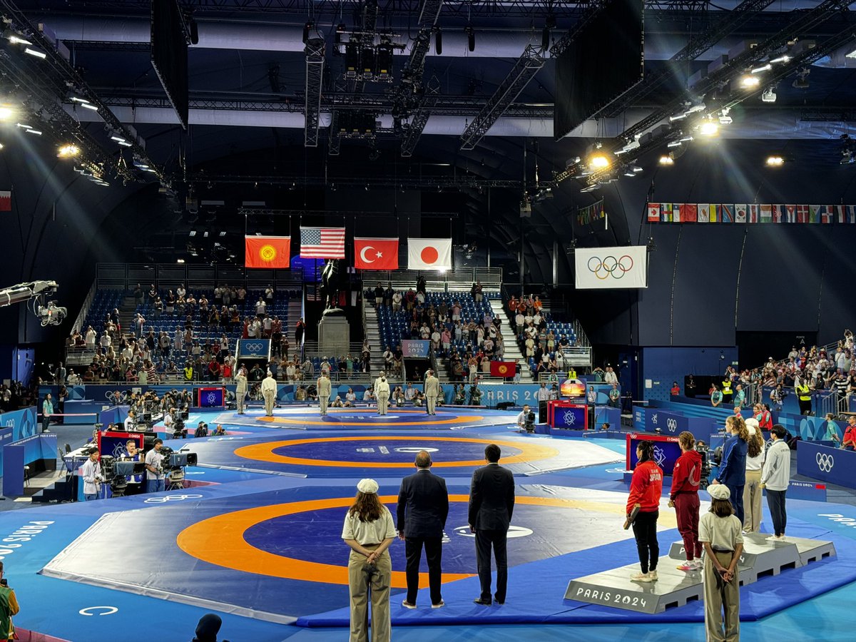 Just casually introducing her to wrestling with a US gold