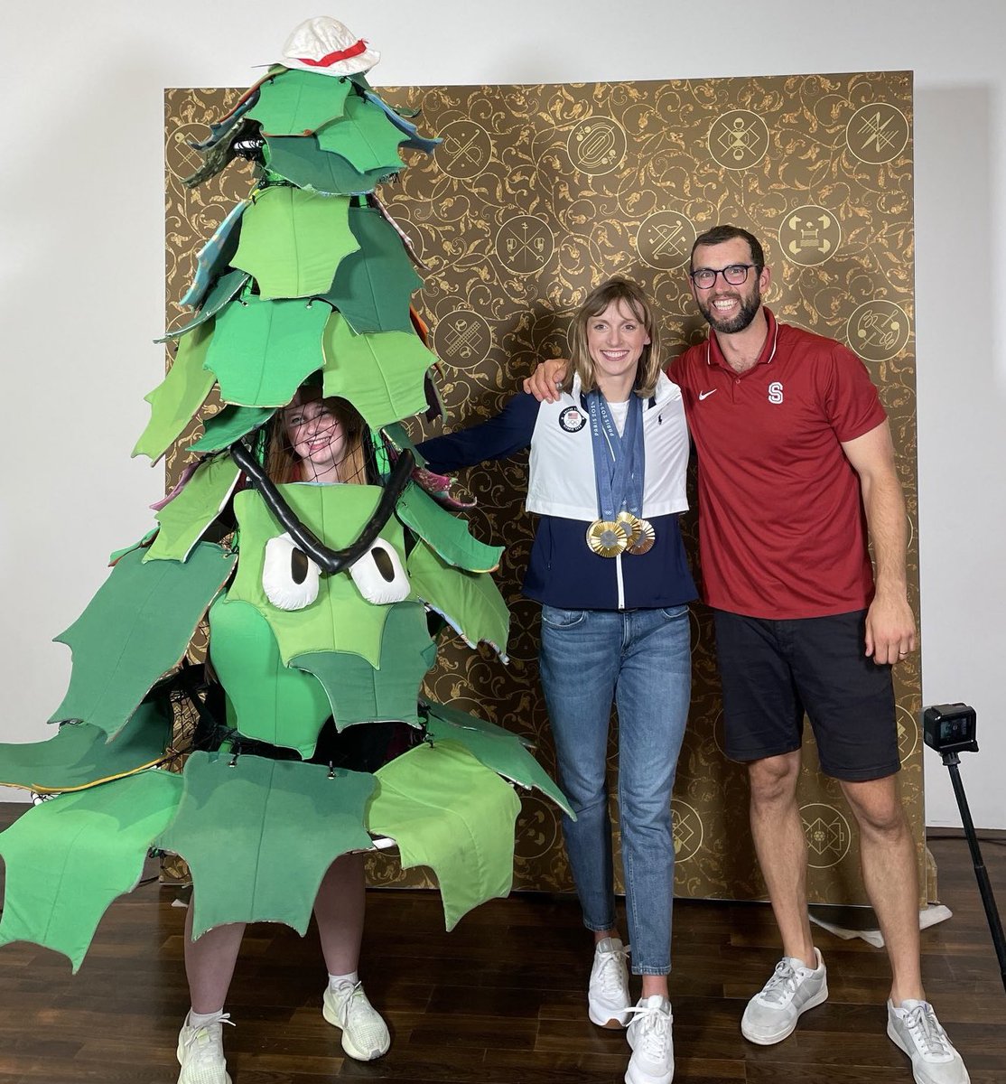 Absolutely love this! Three legends in one photo! Thanks to <a href="/StanfordFball/">Stanford Football</a> great Andrew Luck and Olympic champion <a href="/katieledecky/">Katie Ledecky</a> for always representing @stanford in a first class manner.
