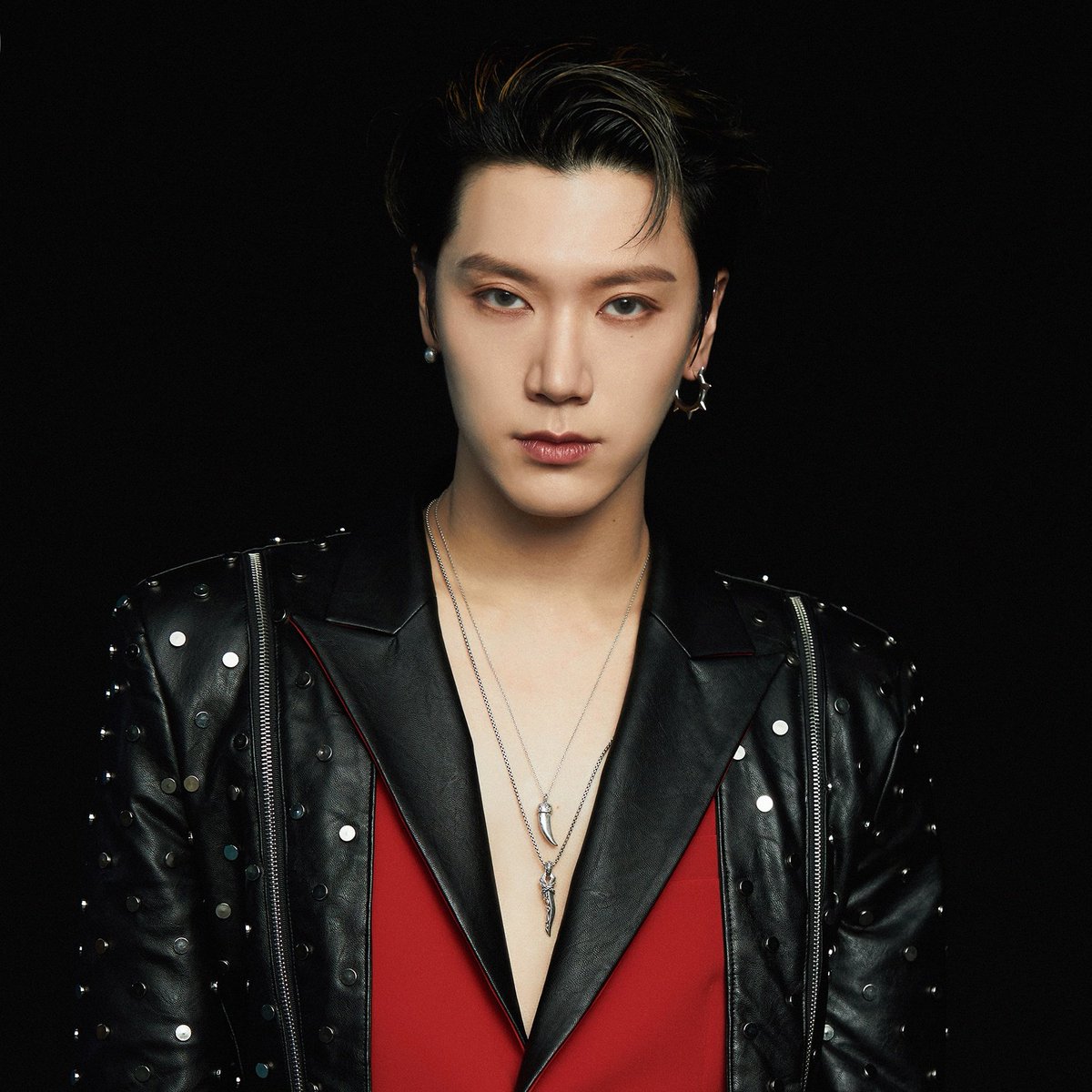 slowly losing his teenage facial features