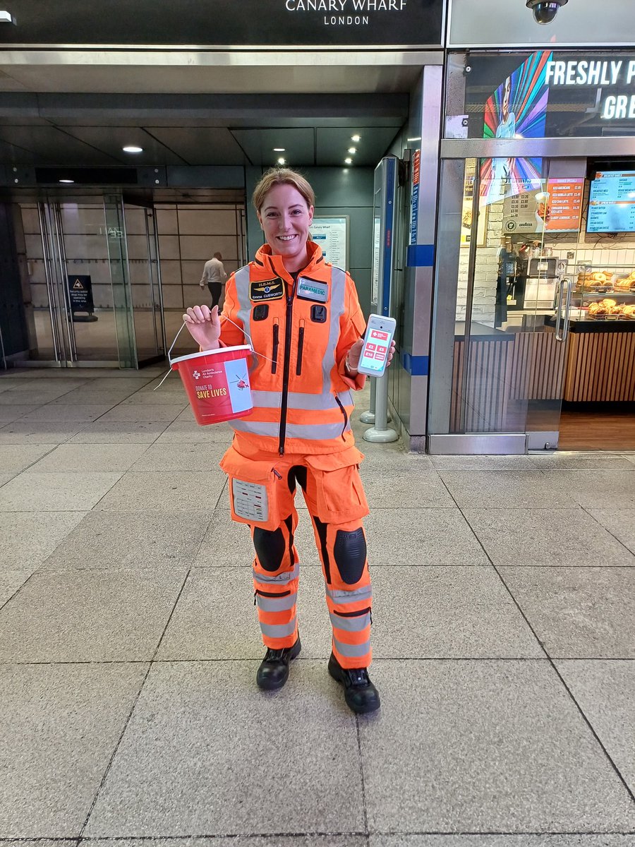 We're collecting for <a href="/LDNairamb/">London's Air Ambulance Charity</a> at Canary Wharf tube station this morning and we have flight paramedic Emma with us being a star!
